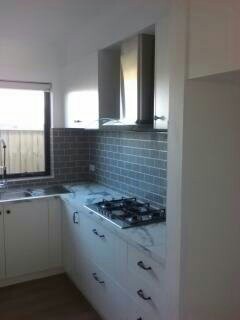 Tile splash back and install exhaust fan Clyde North